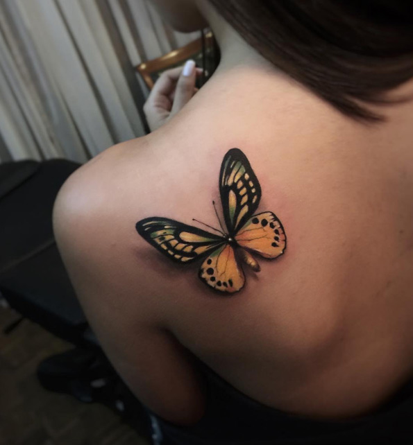 Magnificent butterfly tattoo by Alex Bruz