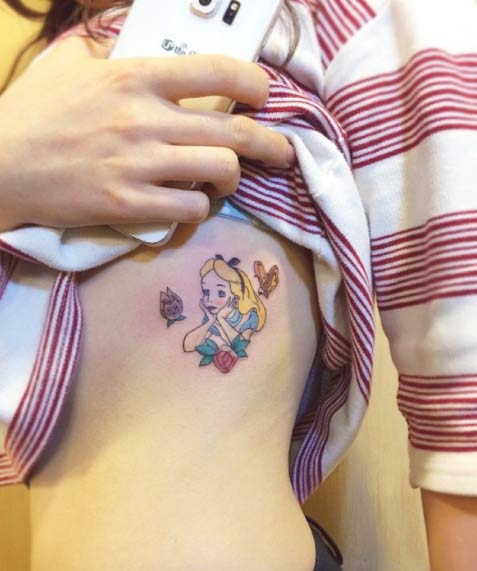 Alice in Wonderland Tattoo by Yammy