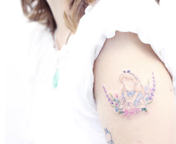 Lovely floral Alice in Wonderland tattoo by Mini Lau