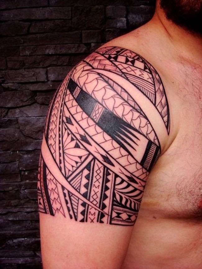 32we-tribal-arm-sleeve-tattoo