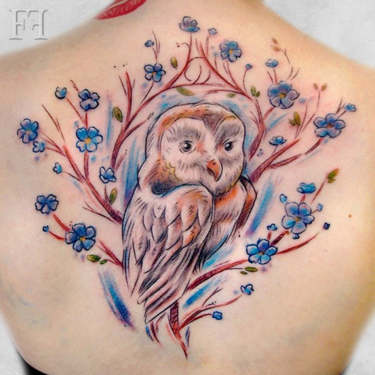 owl tattoo on back