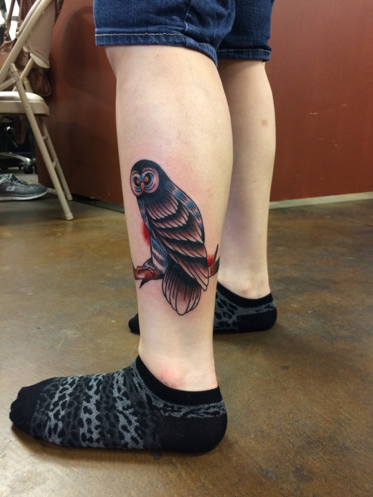 owl-perched-on-branch-tattoo