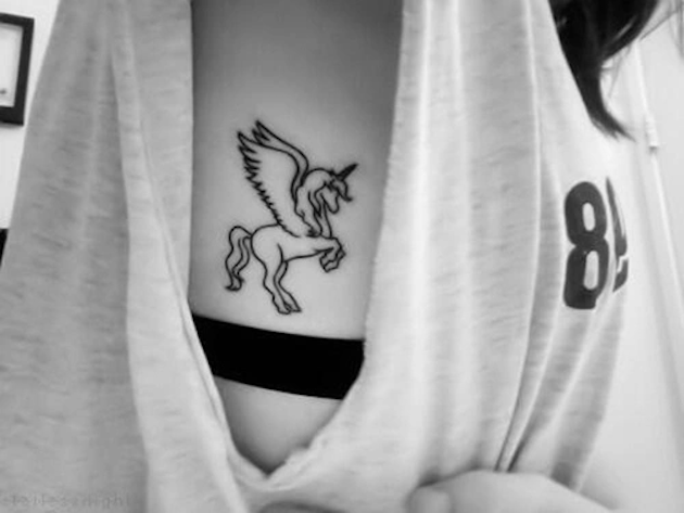 small-ribcaged-unicorn-tattoo