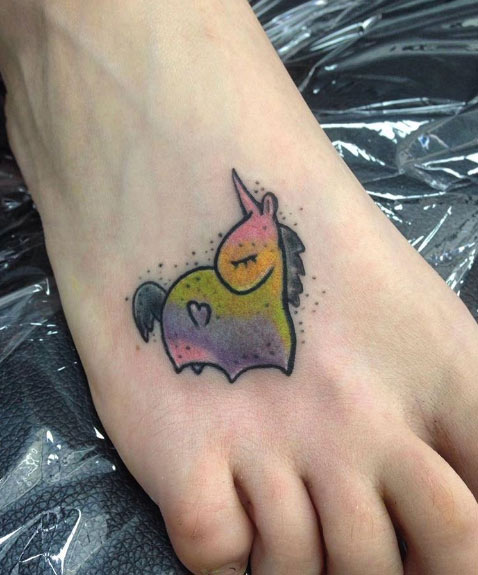 Cute unicorn tattoo on foot by Alexandr Sancheev