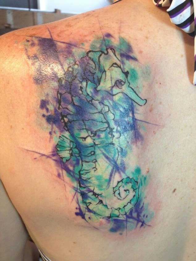 Abstract Watercolor Seahorse Tattoo