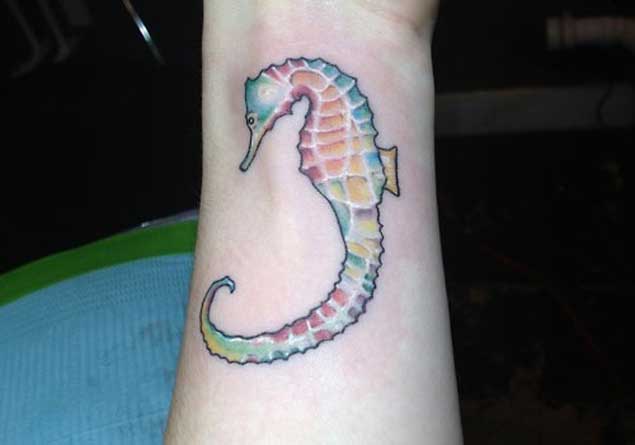 Rainbow Colored Seahorse Tattoo
