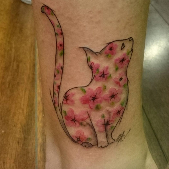 Cherry Blossom-Infused Cat Tattoo by Erdi Can Eker