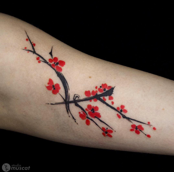 Painted cherry blossom tattoo by Studio Muscat