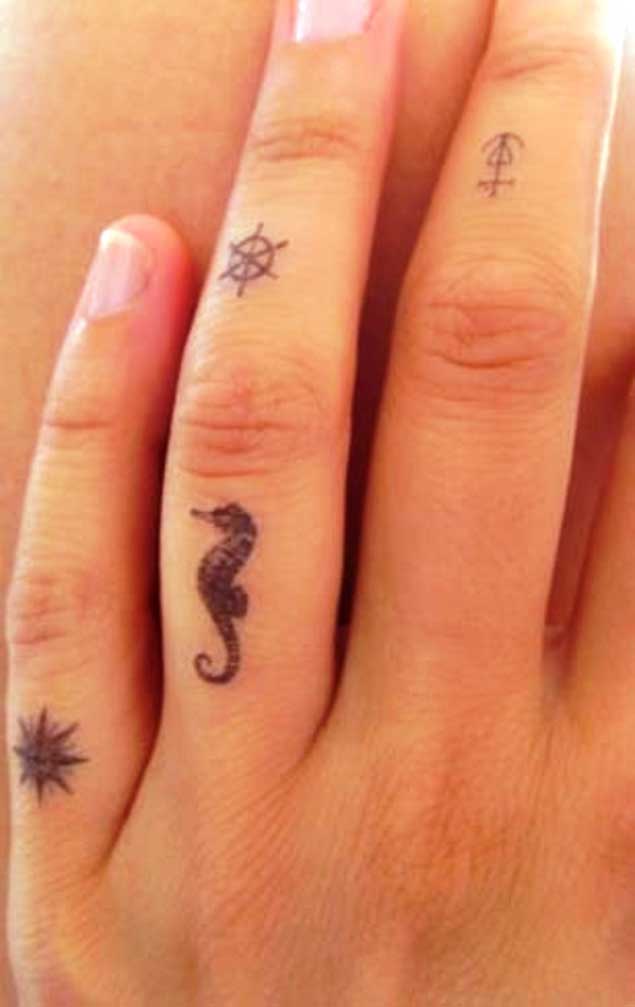 Seahorse Finger Tattoo