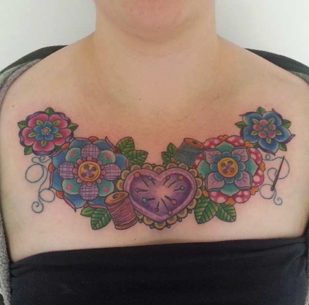 Beautiful chest sewing tattoo