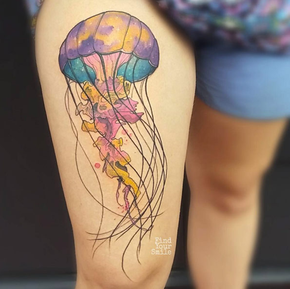 Watercolor jellyfish tattoo on thigh by Russell Van Schaick