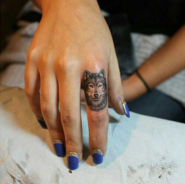 Wolf Tattoo on finger