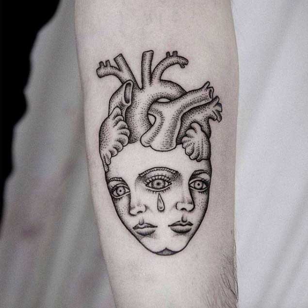 Heart and Face Tattoo by Uls Metzger