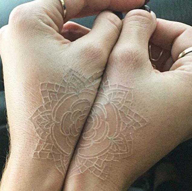 Symmetrical White Ink Tattoo