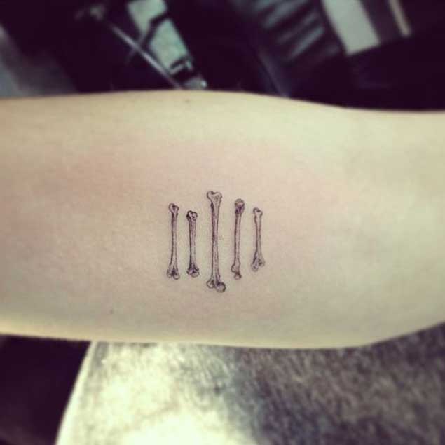 Small bones tattoo