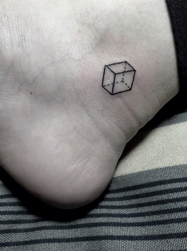 See-through cube tattoo