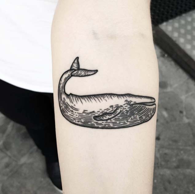 Woodcut whale tattoo