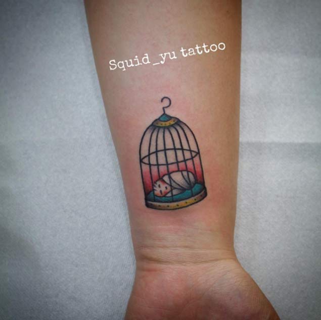 Baby in Birdcage Tattoo by Squid Yu