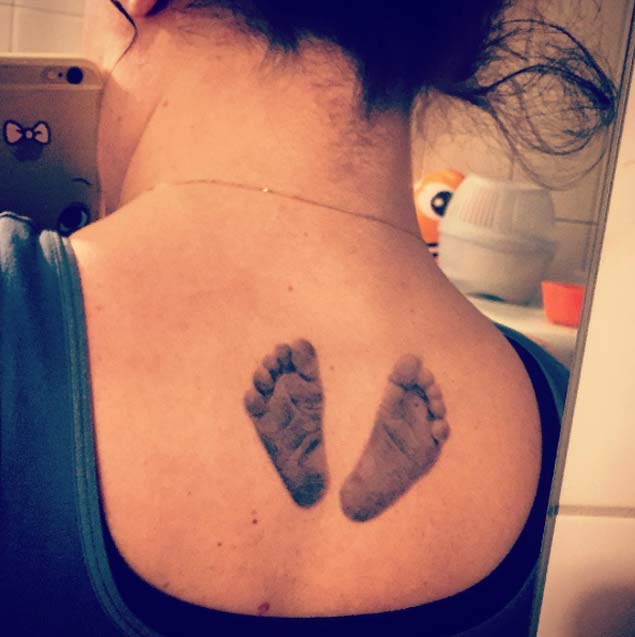 Baby Feet on Back Tattoo