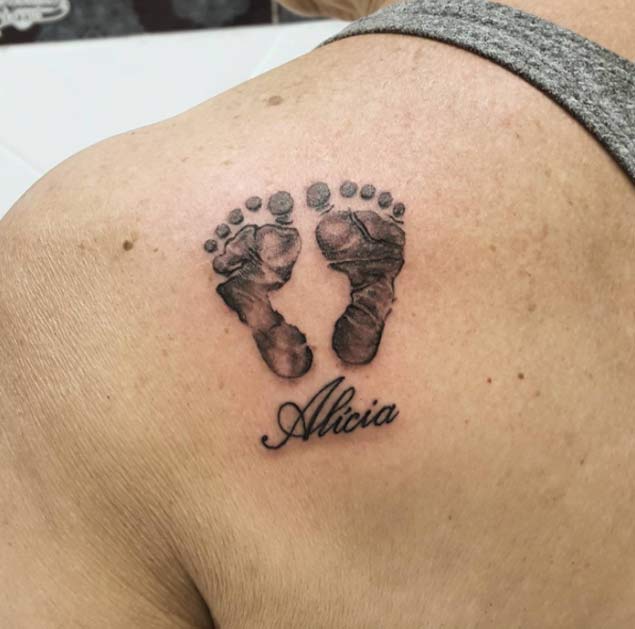 Baby Feet Tattoo by Julio Roslindo