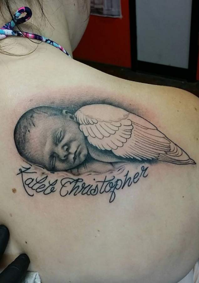 Sleeping Baby Tattoo by Jeremy Scott