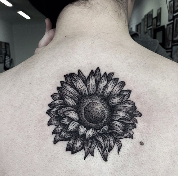 Dotwork sunflower tattoo on back by Annita Maslov