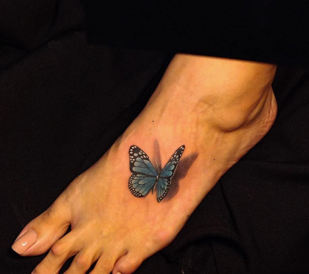 Butterfly Tattoo on Foot by Iron Dragon Tattoo