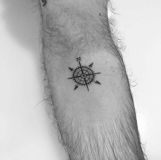 Tiny Compass Tattoo on Forearm