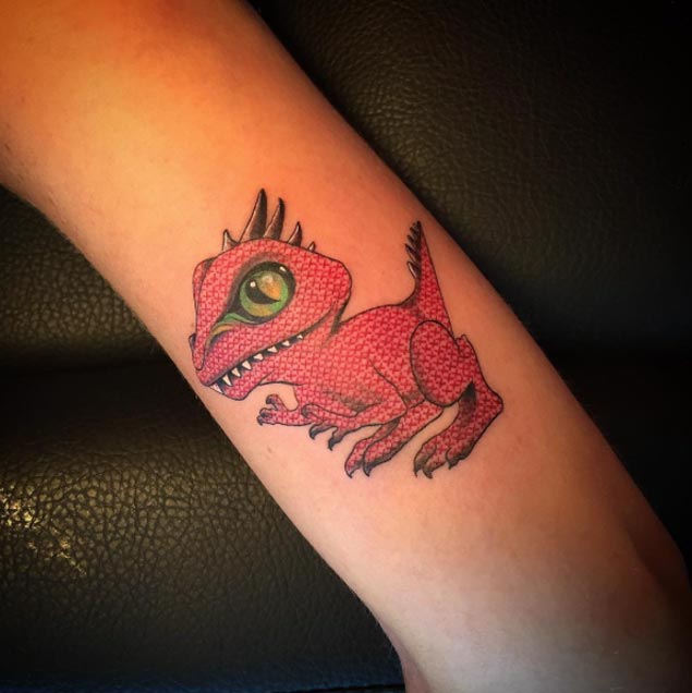 Cross Stitch Dinosaur Tattoo Design