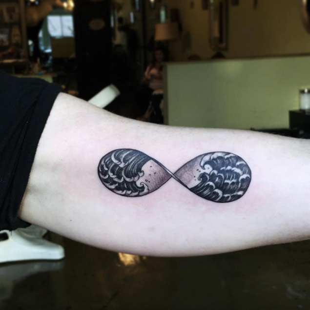 Infinity Symbol Wave Tattoo by June Jung