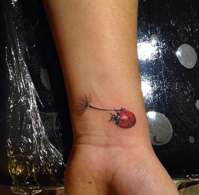 Tiny Dandelion Wrist Tattoo