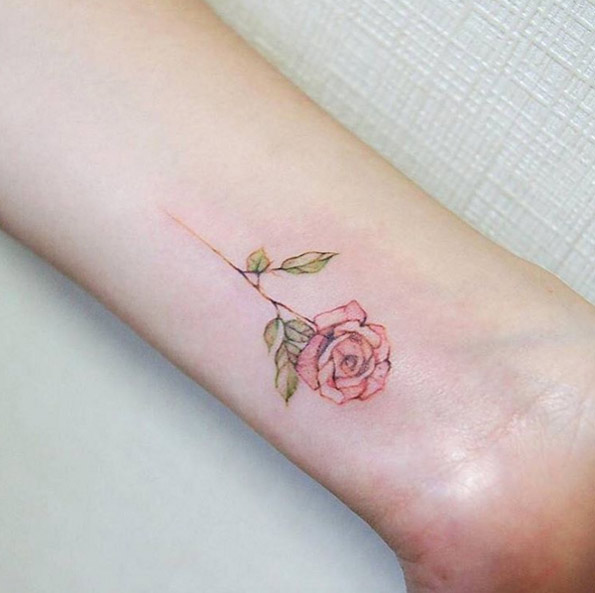 Elegant Pink Rose Tattoo on Wrist