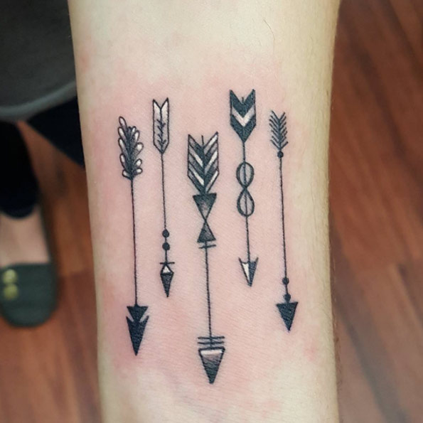 Arrows on Wrist by Victor Figueroa