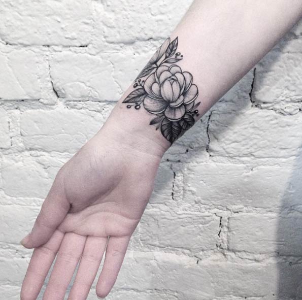 Black and Grey ink Floral Wrist Tattoo by Anna Bravo
