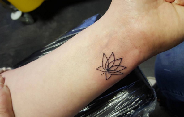 Lotus Flower Tattoo on Wrist by Gem