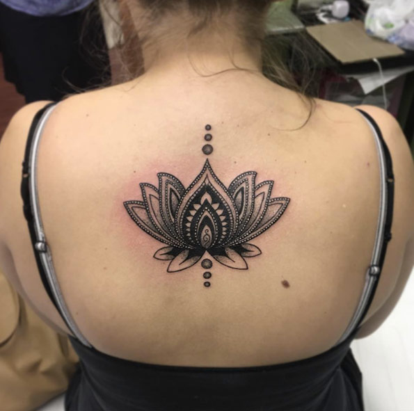 Mandala-themed lotus flower tattoo by Laura S.