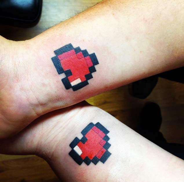 Pixelated Heart Couple Tattoos by Valerie Jane