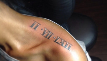 Roman Numeral Tattoos on Shoulder by scorpdaboy