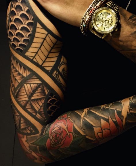 Spiraling Japanese/Tribal Sleeve Tattoo by Christopher Noogin