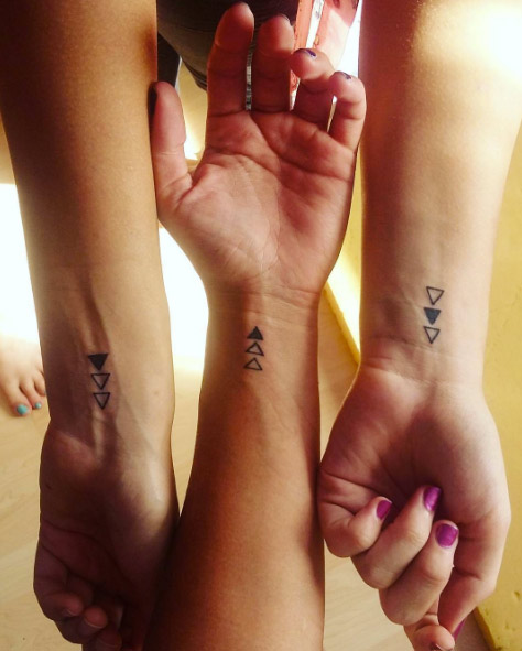 Triangular wrist tattoos for siblings via Nagy Niki