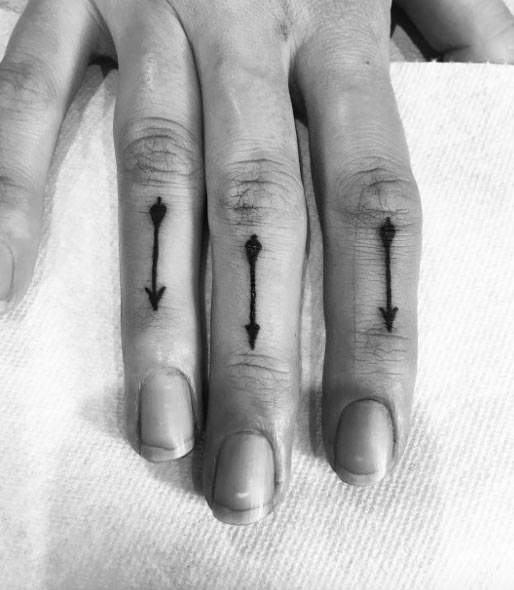 Arrow Tattoos on Finger by Kc Cooper