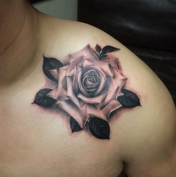 Elegant Blackwork Rose Tattoo by Chris Carter
