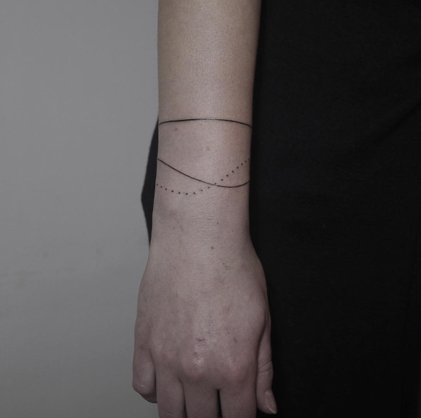 Elegant Bracelet Tattoo by Rachainsworth