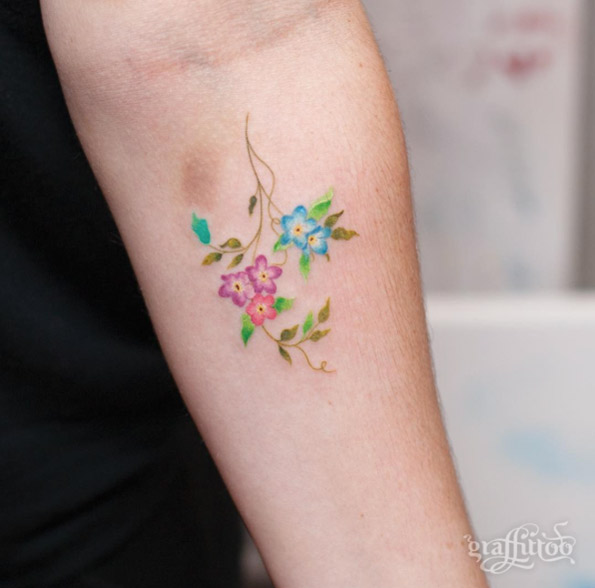 Cute Floral Tattoo on Forearm by Graffittoo