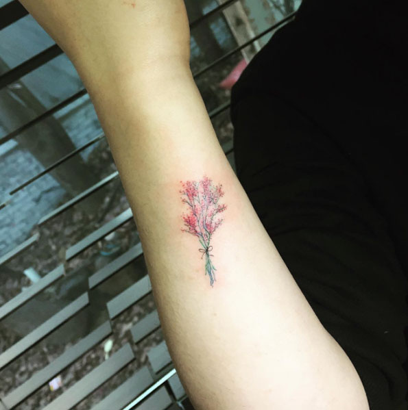 Small Floral Tattoo on Wrist by Hongdam