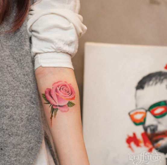 Pink Rose Tattoo on Forearm by Graffittoo