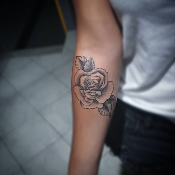 rose tattoo forearm