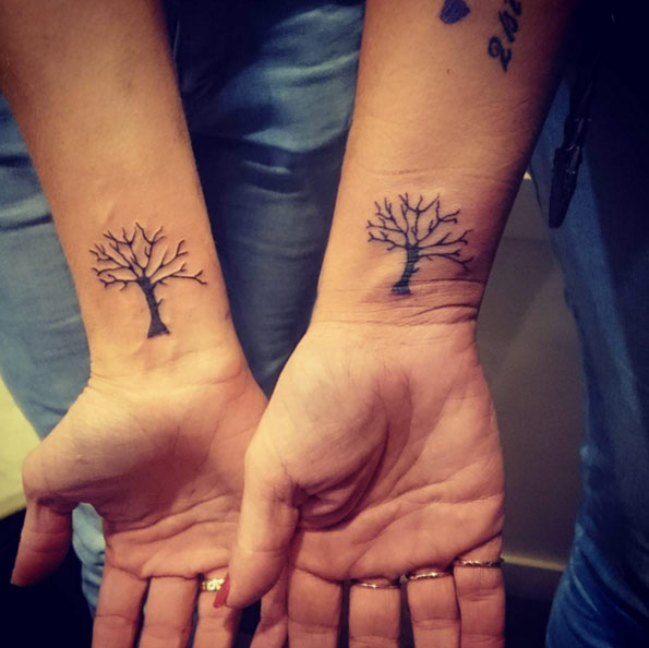 Matching Tree Sister Tattoos by Mathew Holland