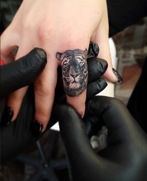 Tiger Finger Tattoo by Cido