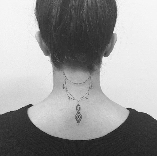 Dangling Back Neck Tattoo by Jon Boy